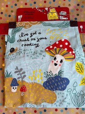 Blue Q Light Blue Apron with Red & Yellow Mushroom Accents